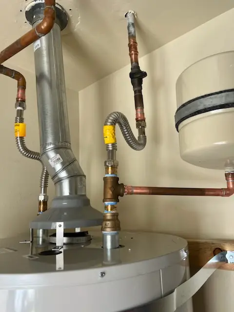Water heater installation and plumbing repair in New Boston